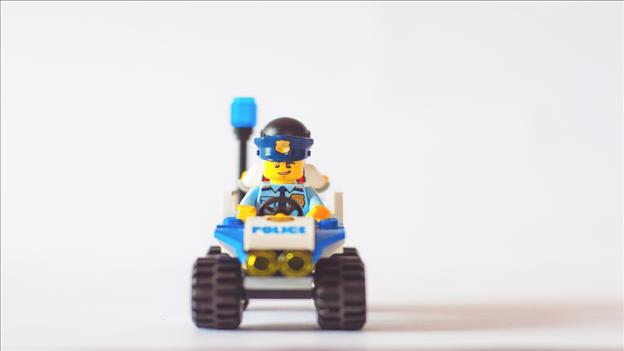Lego car with lego police man